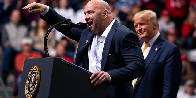 President Donald Trump looks on as Ultimate Fighting Championship President Dana White speaks during a campaign rally at the Broadmoor World Arena, Feb. 20, in Colorado Springs, Colorado. (AP Photo/Evan Vucci)