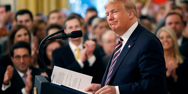 President Donald Trump pauses as he speaks in the East Room of the White House in Washington, Thursday, Feb. 6, 2020. (AP Photo/Patrick Semansky)