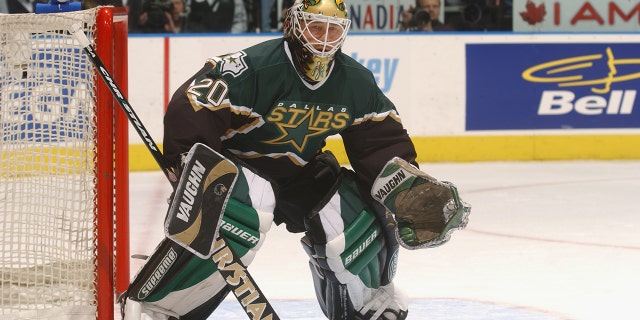 Former Goaltender Ed Belfour #20 of the Dallas Stars readies for the shot against the Toronto Maple Leafs during the NHL game at Air Canada Centre in Toronto, Ontario, Canada. (Photo by Dave Sandford/Getty Images/NHLI)