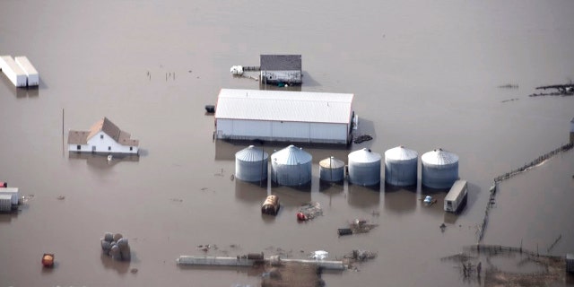 This March 2019, file photo, taken by the South Dakota Civil Air Patrol and provided by the Iowa Department of Homeland Security and Emergency Management shows flooding along the Missouri River in rural Iowa north of Omaha, Neb.