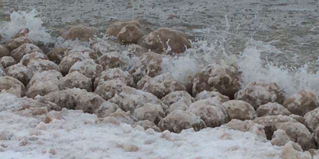 The ice balls spotted Friday along Lake Michigan varied in size.