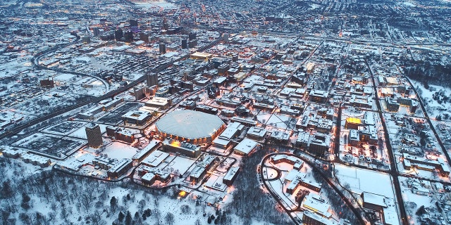Syracuse University campus covered by heavy snow. The city of Syracuse is the snowiest city in the U.S., based on 30-year average totals.