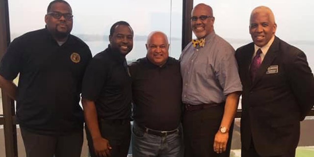 Pictured left to right: Cary Chavis (community relations, Impact Agency); Braylon Harris (director of Impact Agency); Dennis Naicker (pastor of Trinity Ministries from South Africa); Eric Doshier (recruitment coordinator of Impact Agency); and Ronald Blanchard (education coordinator for Impact Agency).
