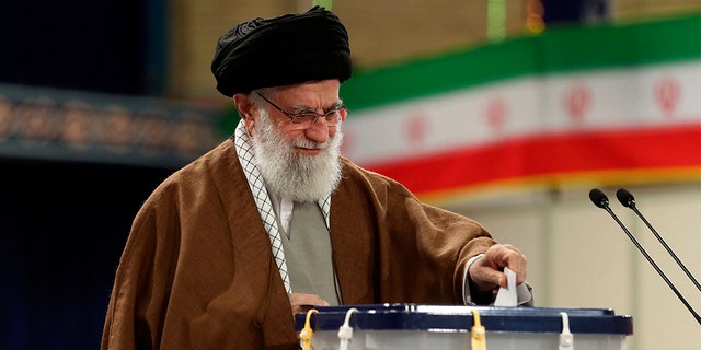 Iranian Supreme Leader Ayatollah Ali Khamenei casts his ballot in the parliamentary elections, in Tehran, Iran, on Friday. (AP/Office of the Iranian Supreme Leader)