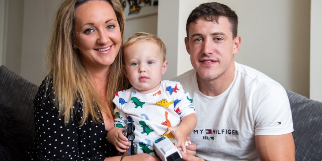 Harriet Alcock and Dan Jebbitt with their son Ronnie.