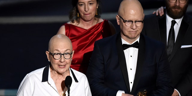 Julia Reichert, left, and Steven Bognar accept the award for best documentary feature for "American Factory." (AP Photo/Chris Pizzello)