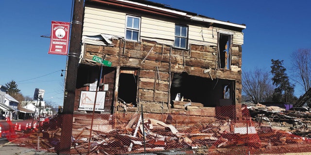 The log cabin was found inside a former bar slated for demolition.