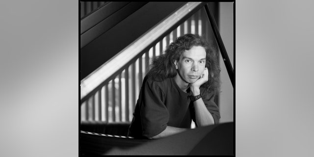 Lyle Mays, jazz pianist at the Yamaha piano showroom, West 57th St., New York City. Sept. 30, 1988.