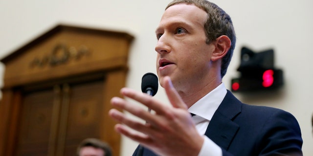 Facebook CEO Mark Zuckerberg testifies before a House Financial Services Committee hearing on Capitol Hill in Washington, Wednesday, Oct. 23, 2019, on Facebook's impact on the financial services and housing sectors. (AP Photo/Andrew Harnik)