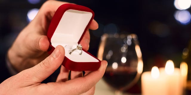 A newly engaged woman asked others on Reddit if she was wrong for wearing her own engagement ring (not pictured) to a New Year's Eve party in which a close family member was also getting engaged.