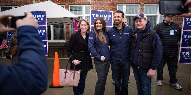 This is a photo of Nate Campbell, right, with Donald Trump Jr., Kimberly Guilfoyle, and his mother Cathy Campbell, left, at Winham High School in New Hampshire before the alleged assault.