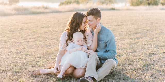 Callie and Kevin Colwick with baby Kenzi before Callie lost her feet.