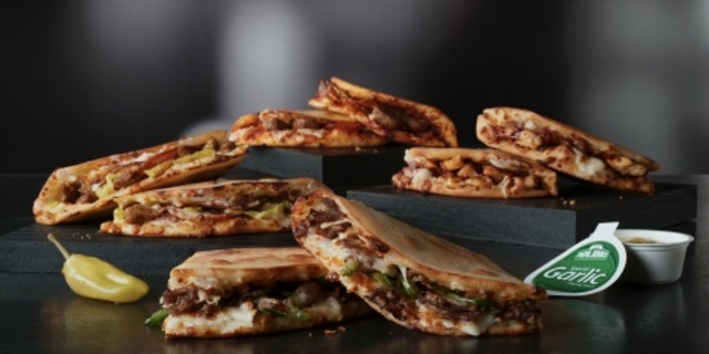 The panini-adjacent offering comes in four pizza-like flavors, which all use the same “hand-stretch, oven-baked” bread.
