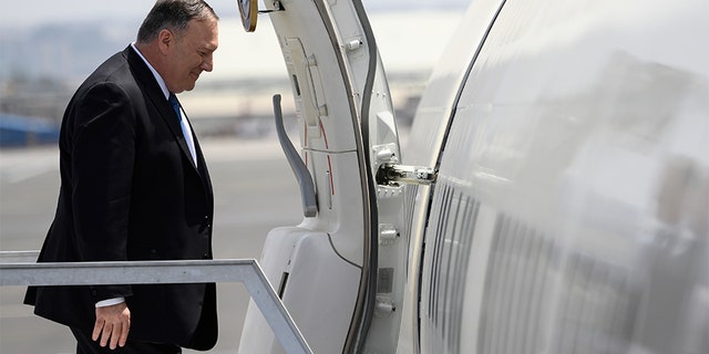 U.S. Secretary of State Mike Pompeo enters the plane before departing from the Addis Ababa Bole international Airport in Addis Ababa, Ethiopia, on Wednesday. (AP)