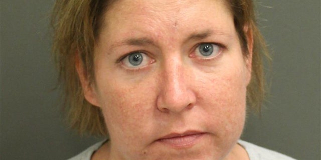 Sarah Boone, 42, of Winter Haven, Fla., was arrested on second-degree murder charges after deputies found her boyfriend dead in a zippered suitcase. (Orange County Fla. Jail)