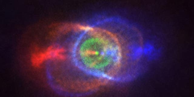 The Atacama Large Millimeter/submillimeter Array captured the bright blue and red clouds of gas surrounding the binary star system known as HD101584.