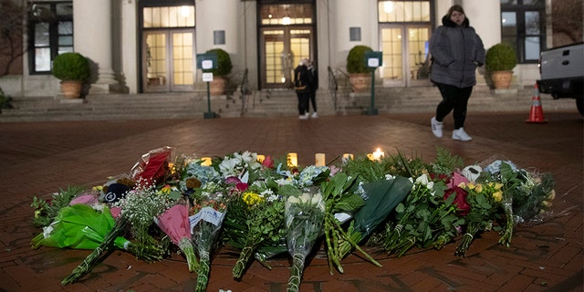 In this December 2019 photo, a woman walks past a make-shift memorial for Tessa Majors inside the Barnard College campus in New York. (AP)