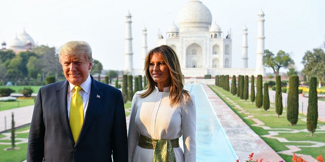 US President Donald Trump and First Lady Melania Trump pose as they visit the Taj Mahal in Agra on February 24, 2020. (Photo by Mandel NGAN / AFP) (Photo by MANDEL NGAN/AFP via Getty Images)