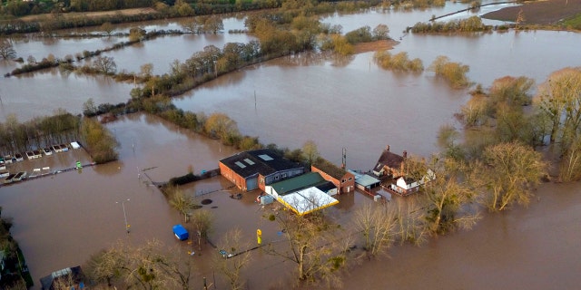 Flood water surrounds Upton upon Severn, England, Tuesday Feb. 18, 2020.