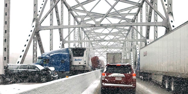 In this photo released by the Missouri State Highway Patrol, a multi-vehicle pileup on Interstate 70 on the bridge that spans the Missouri River near Rocheport, Mo., is shown during a winter storm, Wednesday, Feb. 5, 2020.