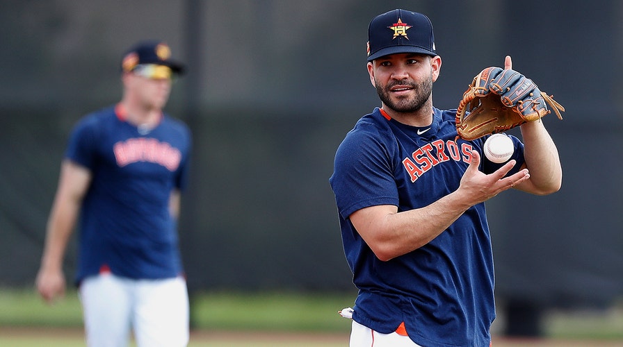 Houston Astros players heckled by fans during batting practice at