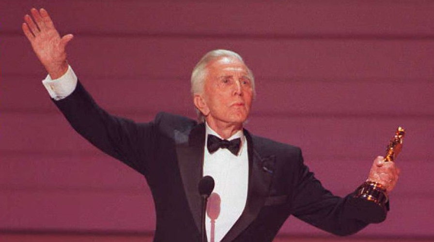 Kirk Douglas' daughter-in-law Catherine Zeta-Jones reacts to his death