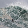 Sebastian Steudtner from Germany rides a wave during a surfing session at Praia do Norte or North Beach in Nazare, Portugal, Feb. 15, 2020. 