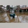 A mailbox stands above the Pearl River floodwater in this northeast Jackson, Miss., neighborhood Sunday.