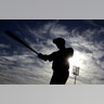 Texas Rangers' Elvis Andrus swings a bat during the team's photo day at spring training baseball practice in Surprise, Arizona,?Feb. 19, 2020.