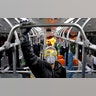 A worker disinfects a public bus against coronavirus in Tehran, Iran, Feb. 26, 2020. 