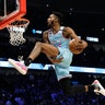 Miami Heat's Derrick Jones Jr. heads to the basket on his way to winning the NBA All-Star slam dunk contest in Chicago, Feb. 15, 2020. 