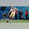 San Francisco 49ers' Mitch Wishnowsky kicks off against the Kansas City Chiefs to begin the NFL Super Bowl LIV football game in Miami Gardens, Fla.