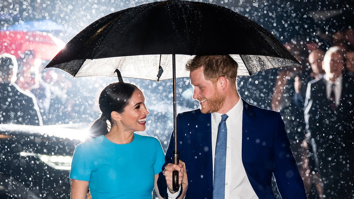 Prince Harry with wife Meghan Markle. (Photo by Samir Hussein/WireImage)
