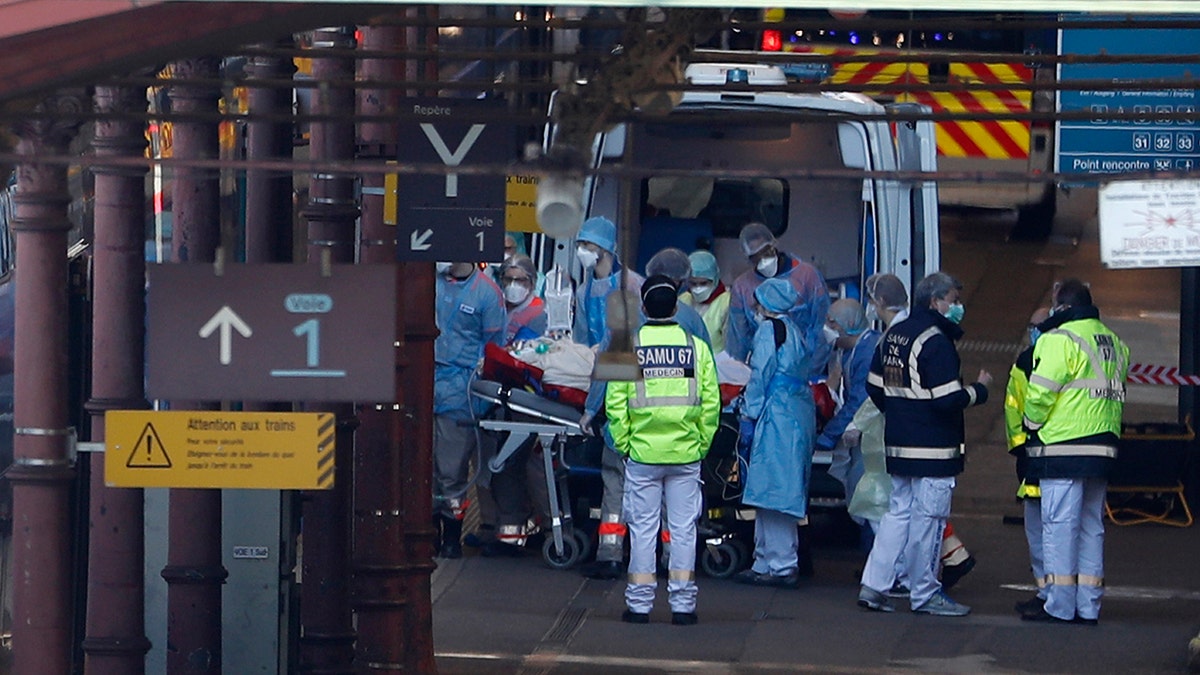 A patient is transferred in a high-speed train turned into an intensive care unit in Strasbourg on Thursday. (AP Photo/Jean-Francois Badias)