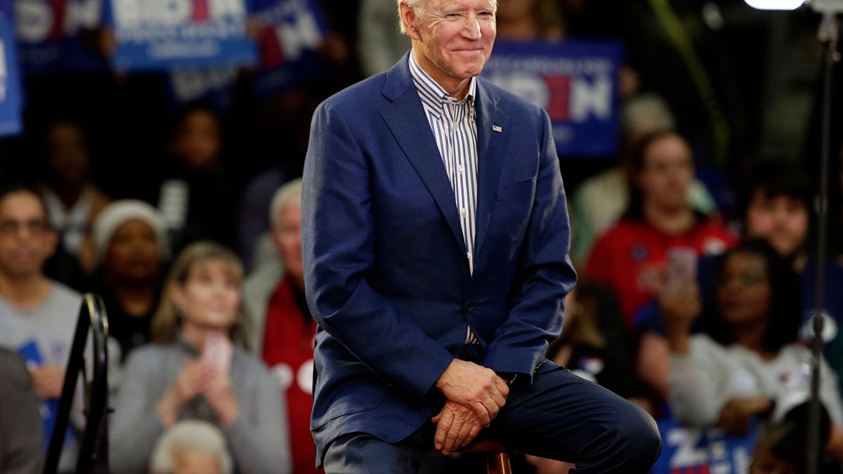 Democratic presidential candidate former Vice President Joe Biden smiles at supporters during a campaign event at Saint Augustine's University in Raleigh, N.C., Saturday, Feb. 29, 2020. (AP Photo/Gerry Broome)