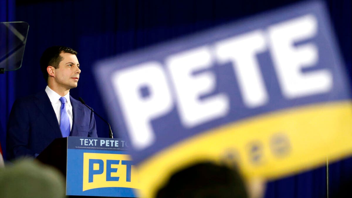 In this Feb. 11 photo, Democratic presidential candidate former South Bend, Ind., Mayor Pete Buttigieg pauses as he speaks to supporters at a primary night election rally in Nashua, N.H. (AP Photo/Mary Altaffer)