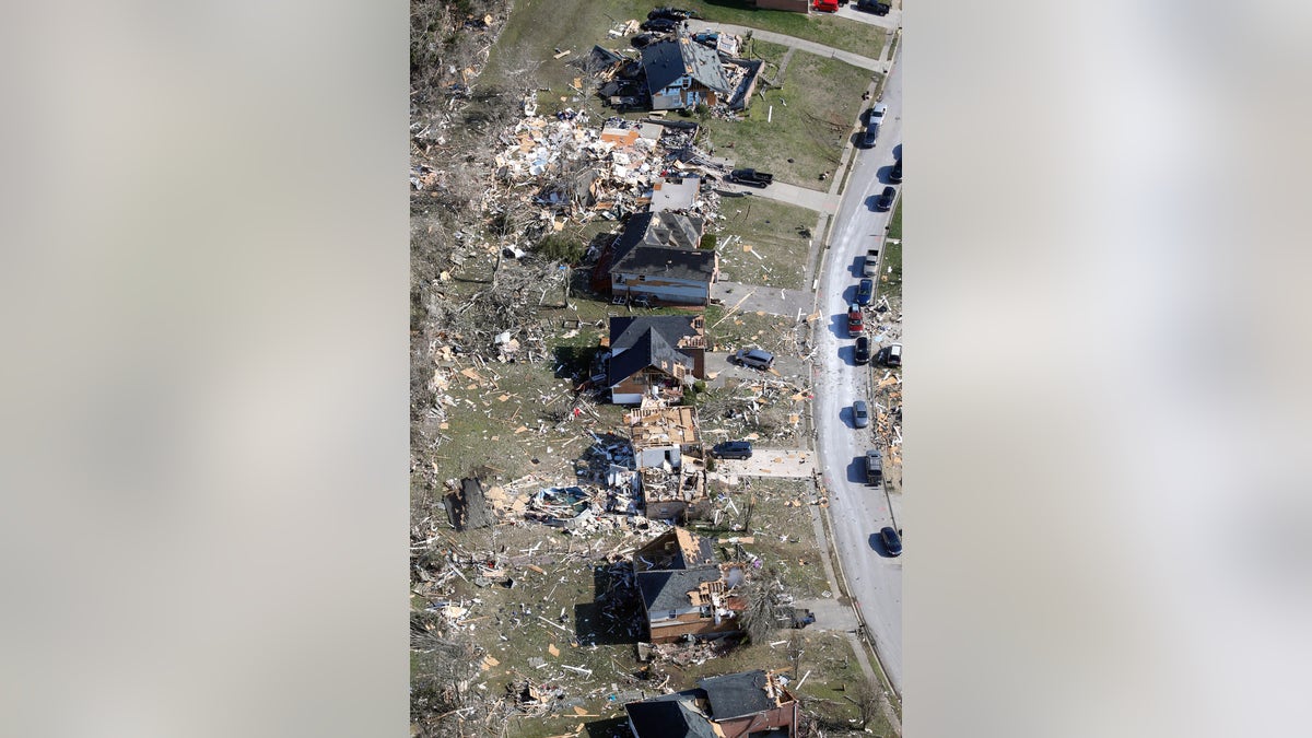 Destroyed homes line a street Tuesday, March 3, 2020, near Lebanon, Tenn. Tornadoes ripped across Tennessee early Tuesday, shredding more than 140 buildings and burying people in piles of rubble and wrecked basements. (AP Photo/Mark Humphrey)