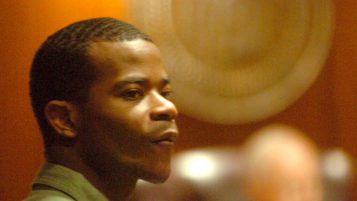 FILE - In this Oct. 10, 2005, file photo, Nathaniel Woods watches as the jury enters the courtroom during his murder trial in Birmingham, Ala.  (Mark Almond/The Birmingham News via AP, File)