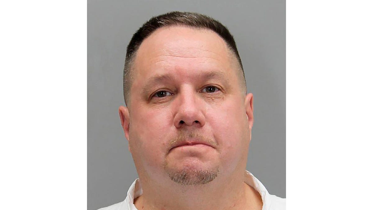 This undated photo provided by the Fairfax County Police Police shows Michael Hetle. Fairfax County police said Hetle, 52, was arrested on Tuesday, March 3, 2020, in the shooting death of Maryland National Guard Specialist Javon Prather, 24, in Springfield, Virginia. (Fairfax County Police via AP)