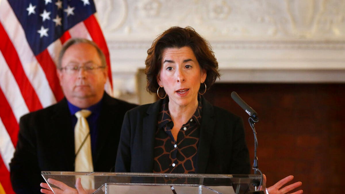 Rhode Island Gov. Gina Raimondo speaks to reporters at the Rhode Island Statehouse, March 22, 2020, in Providence. (Associated Press)