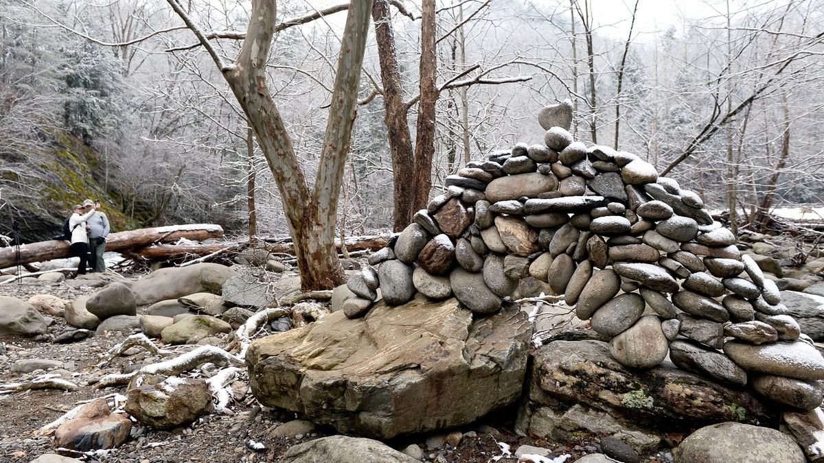 Hikers take a moment to take a selfie at the water side of the Y in the Great Smoky Mountains National Parks in this file photo. (Joy Kimbrough/The Daily Times via AP,File)