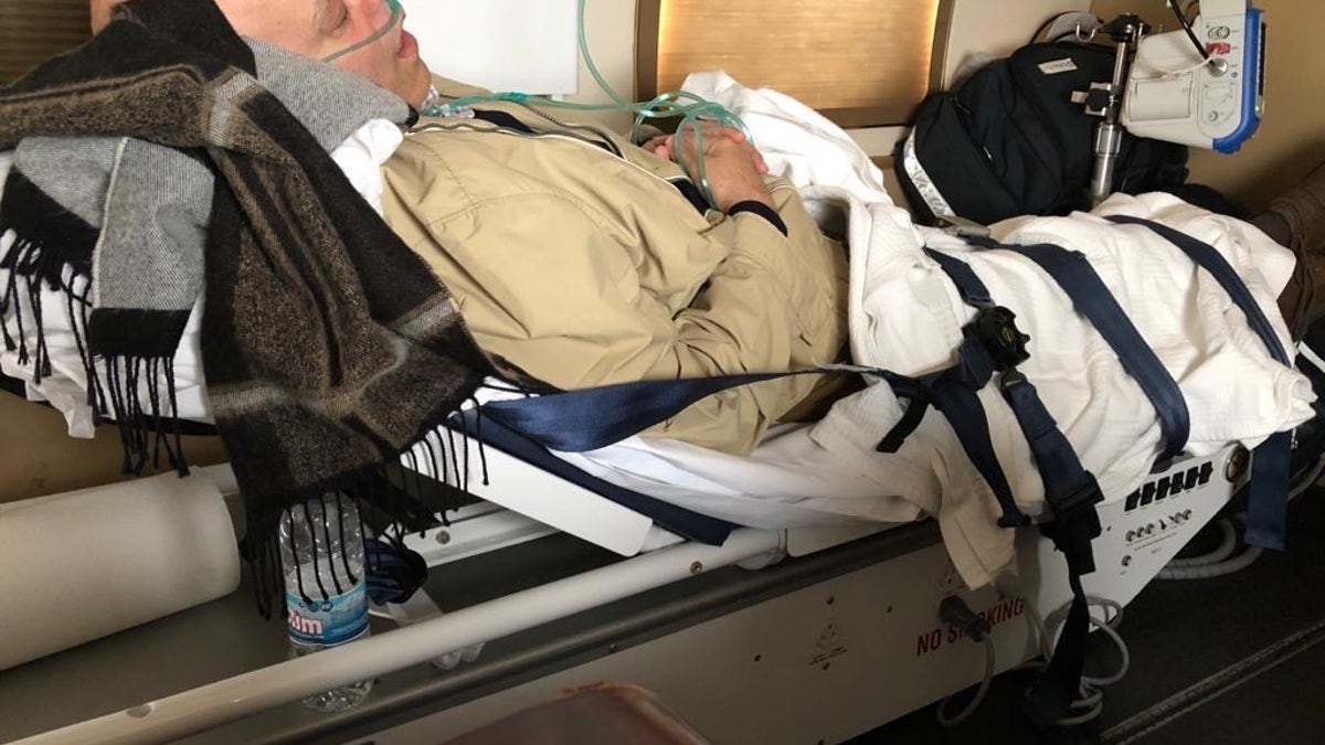 Amer Fakhoury resting on stretcher on his way home to the U.S. Courtesy of the Fakhoury family.