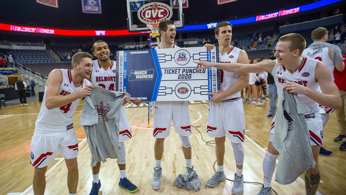 Belmont's Garrett Murphy (4), Michael Benkert (24), Seth Adelsperger, Tyler Scanlon (0) and Adam Kunkel celebrate the team's win over Murray State. (AP Photo/Daniel R. Patmore)