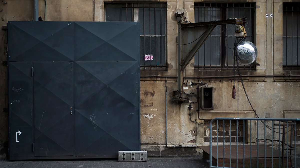 In this March 25, 2020, photo, an entrance to music club Alte Muenze is locked in Berlin, Germany. (AP Photo/Markus Schreiber)