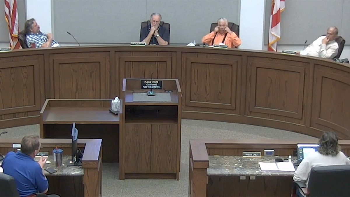 Okeechobee County Commission meeting Friday. Bryant Culpepper is third from left.