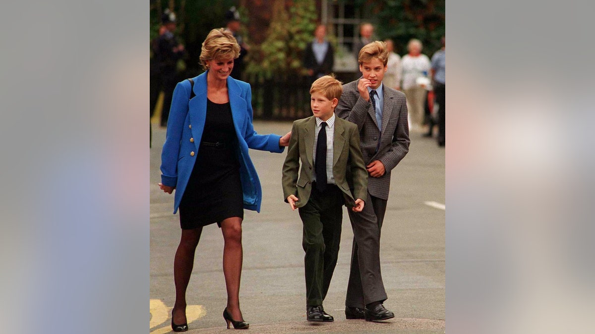 Prince William arrives with Diana, Princess of Wales and Prince Harry for his first day at Eton College on September 16, 1995 in Windsor, England