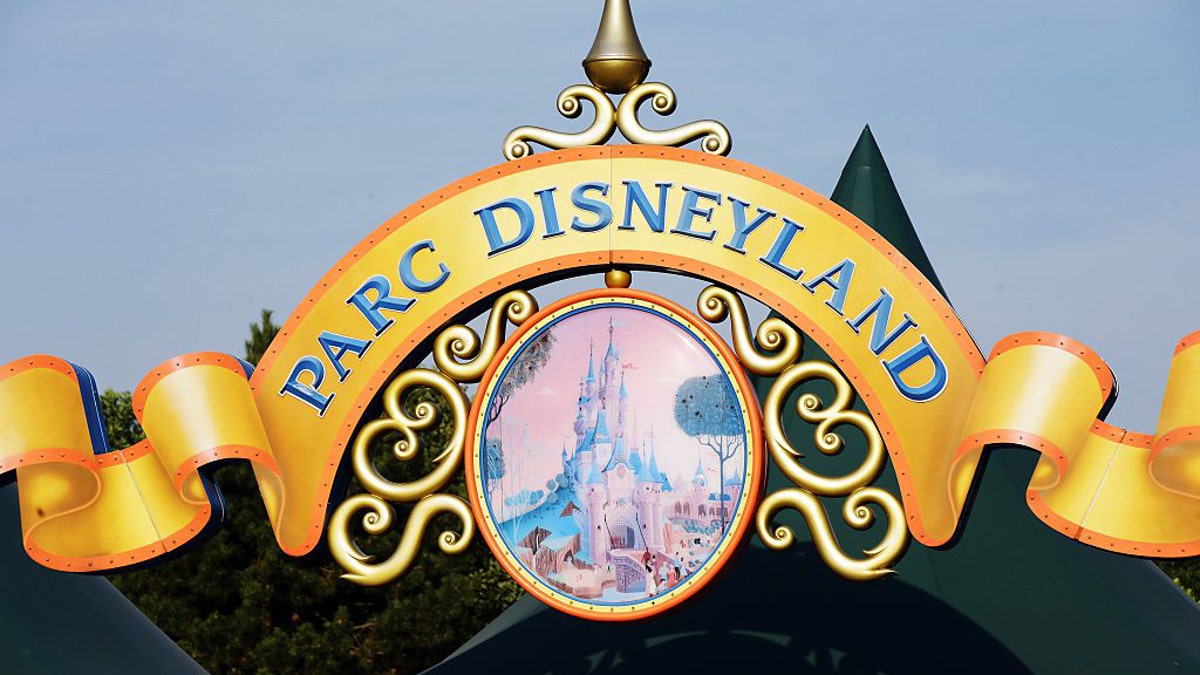 A Disney employee has gone viral for all the wrong reasons after interrupting a couple's marriage proposal at Disneyland, Paris.