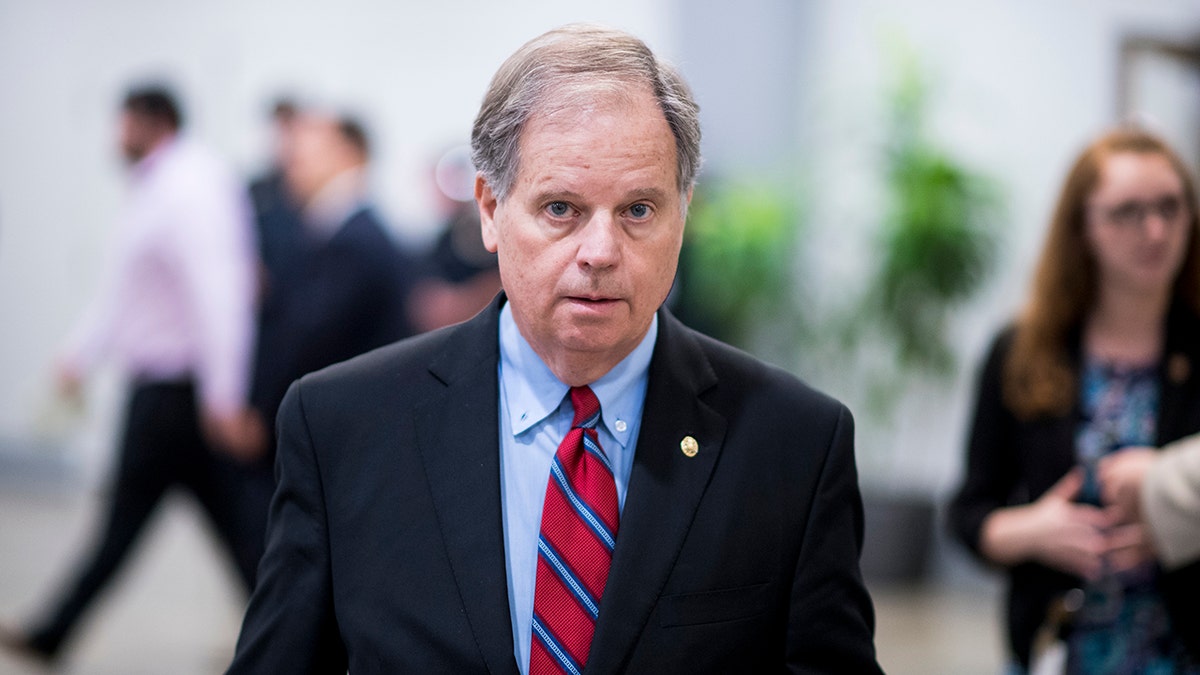 UNITED STATES - OCTOBER 10: Sen. Doug Jones, D-Ala., arrives in the Capitol for a vote on Wednesday, Oct. 10, 2018. (Photo By Bill Clark/CQ Roll Call)