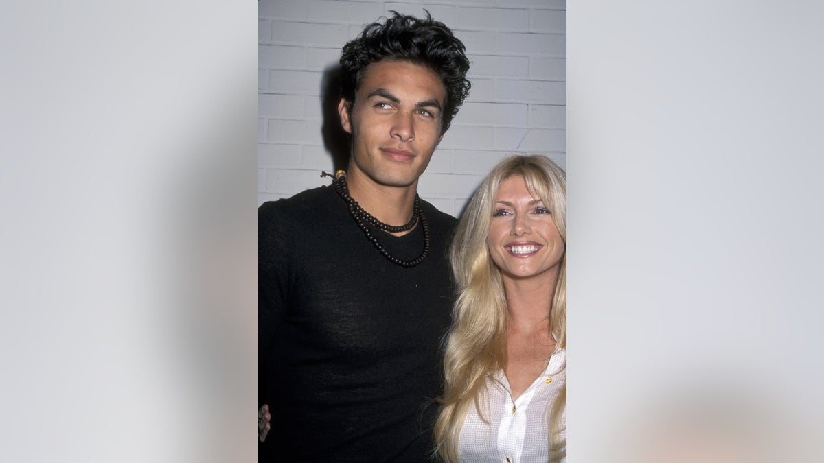Jason Momoa and model Brande Roderick attend Miramax Party in Honor of Henry Diltz on November 30, 2000, in Los Angeles, California.
