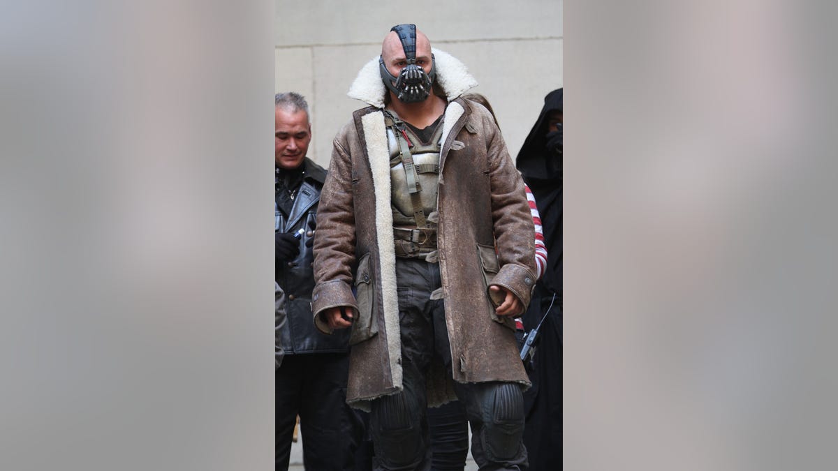 Tom Hardy is seen in costume as Bane on the set of 'The Dark Knight Rises' on location on Wall Street on November 5, 2011 in New York City.?